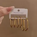 Set di tre paia di orecchini a cerchio esagonali in acciaio inossidabile dorato. - Stile Geometrico Esagonale (E1245) / Oro