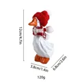 Dimensions and weight detail for the white Christmas goose figurine with red hat. - Christmas Decor Style / Red Hat