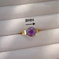 Close-up view of a gold stainless steel ring featuring an 8mm purple dried flower - Gold Base Purple Dried Flower Style(1) / Purple