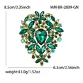 Grande spilla di lusso in cristallo verde per donna con elegante design floreale e cuore - Oro KC - Verde (2809-GN)