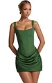 Close-up of elegant green square neck corset mini dress with draped ruched skirt detail - Green
