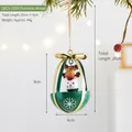 Festive Christmas iron moose hanging ornament featuring a green base and elegant gold bow - Basket Reindeer (QX25-1059)