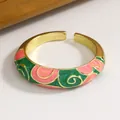 Adjustable vintage gold plated enamel swirl ring with vibrant pink and green patterns - Pink And Green Contrast Enamel (Z-023) / Gold
