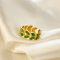 Retro gold finish open ring with green enamel leaf design on silk background - Green Olive Leaf (WG-1196) / Gold