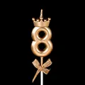 Elegant golden number 8 birthday candle featuring a crown top and glittery bow decoration - Crown Bow Number 8 / Champagne