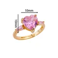 Detailed view of 10mm pink heart-shaped stone on gold adjustable ring - Heart Pink Zirconia with Baguette Side Stones Style (G255184G)