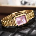 Macro view of a luxury gold square ladies watch with a radiant pink gradient dial - Square Watch (M1620) / Purple Dial Gold Case