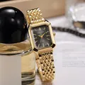 Close-up of gold square women's watch with elegant metal linked strap and black dial - Square Watch (M1620) / Black Dial Gold Case