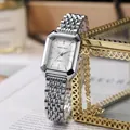 Close-up of silver rectangular lady's quartz watch with link strap on decorative background - Square Watch (M1620) / White Dial Silver Case