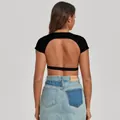 Slim fit black backless athletic yoga top for women perfect for gym and running - S / Tops / Black