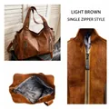 Vintage light brown tote bag with rivet detail and single zipper closure SKU view - Single Zipper Style / Tan
