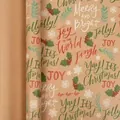 Festive Christmas wrapping paper roll featuring holiday typography on brown kraft paper - Red and Green Letters / 43*300cm Roll