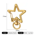 Star shaped stainless steel lobster clasp in gold finish with 37mm and 29mm dimensions - Smooth Polished Star / Gold