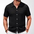 Men's black short-sleeve knit polo shirt with jacquard texture and button-up front. - M / Tops / Black