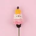 Detailed view of hand-knitted crochet bear star flower decoration for festive bouquets - Christmas Tree Bear Doll Stem / Pink