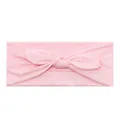 Diadema deportiva de algodón elástico rosa suave con nudo de lazo decorativo central - Rosa