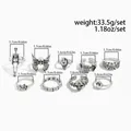 Vintage gothic silver-tone skull and skeleton ring set with dimension and weight specs - 9-Piece Set (06647) / Antique Silver