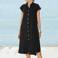 Full front view of a black stand collar linen midi dress showing white buttons and pocket - S / Dresses / Black