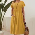 Detail of mustard yellow cotton linen dress with pleated bodice and pockets - 5XL / Dresses / Yellow