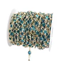 Vue détaillée d'une chaîne en perles de verre 6mm teal avec cadre en cuivre doré DIY - 6mm / Verre Bleu Clair-Chaîne Or KC