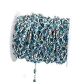 Détail de la chaîne en pierre de verre bleue de 6 mm avec des maillons en cuivre argenté - 6mm / Verre Bleu Clair-Chaîne Argentée