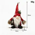Handcrafted Christmas gnome doll ornament with red knitted hat, 23cm tall variant - Knitted Gnome with Red/Black/White Curved Hat Holding Oil Lamp - Men's