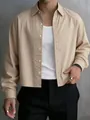 Close-up detail of khaki striped long-sleeve shirt for men with white vertical stripes - Pink Apricot