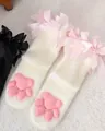 Cute white fuzzy over-knee socks with pink 3D silicone cat paw pads and ribbons. - White