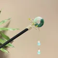 Traditional Chinese ebony hair stick with green jade-style donut and light blue bead tassel - Cyan Gradient Peace Buckle Style (5610)