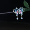 Traditional Chinese style butterfly wooden hairpin with enamel finish and elegant pearl tassels - Sky Blue Pink White Butterfly Pearl Tassel Style (0390) / Sky Blue