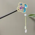 Vintage style Chinese sandalwood hair stick featuring purple enamel flowers and long pearl tassels - Purple and Blue Enamel Flower Tassel Step-Shake Style (2595)