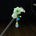 Vintage sandalwood hair stick featuring green jade-like flowers and a teardrop tassel - Light Green Faux Jade Carved Flower Style (6083)