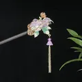Traditional Chinese style sandalwood hairpin with purple floral design and long golden tassel - Purple Gradient Petal Bud Tassel Step-Shake Style (发簪2372)