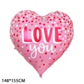 Large pink heart foil balloon with LOVE you print and polka dots for Valentine Day - 63-Inch I LOVE YOU Large Heart