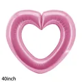Large 40-inch pink hollow heart-shaped foil balloon for Valentine's Day party decor - 42-Inch Pink Hollow Heart