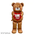 Large standing brown teddy bear foil balloon with 'LOVE YOU' heart, 157cm tall. - Standing Bear Hugging Heart