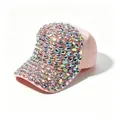 Detailed view of iridescent oval rhinestones embellished on a pink fashion baseball cap - Pink