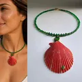 Detail of bead necklace featuring a large red shell pendant and green gemstone beads - Green Inlaid Beads Red Shell (38+5cm)