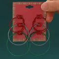Christmas glitter hoop earrings set including 3 pairs in festive red, silver and green. - 3-Pair Glitter Hoop Set (0155)