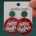 Festive red glitter round earrings featuring white Merry Christmas text with green studs - Merry Christmas Candy Ball (H-228)