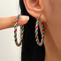Festive red and green glitter twisted Christmas hoop earrings for women and girls. - Christmas Spiral Hoop (A-1382)