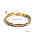 Bracelet élégant en acier titane plaqué or avec des rangées de zircons étincelants. - Bracelet Gaufré en Zircone Blanc (7997) / Or