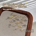 Set of 20 mixed gold and silver snake shaped alloy nail charms with rhinestones 13x6.5mm - XY-888 Mixed Alloy Snakes 13x6.5mm