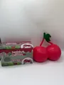 Oversized cherry-shaped squishy flour stress relief toy shown with retail packaging - Cherry Squishy / Jumbo Size (1 Pair) / Red
