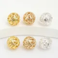 Detailansicht hohler Filigran-Metallperlen in Gold- und Silberoptik für Schmuck - Stil 7
