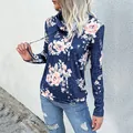 Women's casual navy blue sweatshirt featuring pink floral print and adjustable drawstring hood - S / Tops / Blue