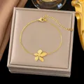 Elegant gold floral titanium steel bracelet with textured petals on jewelry box - Five-petal Flower Bracelet (E2029) / Gold