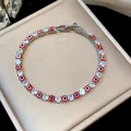 Elegantes rotes Evil Eye und Zirkon Tennisarmband auf einer luxuriösen goldenen Box - Böser Blick Stil (12#)