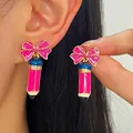 Kreative rosa Glitzer-Schleifen-Ohrringe mit Emaille-Bleistift für einen verspielten Look - 07 Rosa (2691)