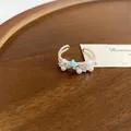 Elegante zilverkleurige verstelbare open ring met witte parels en blauw zeesterontwerp - Zeester Kunstmatige Parel Open Ring (31#) / Zilver/Blauw